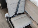 Assembled travel seat