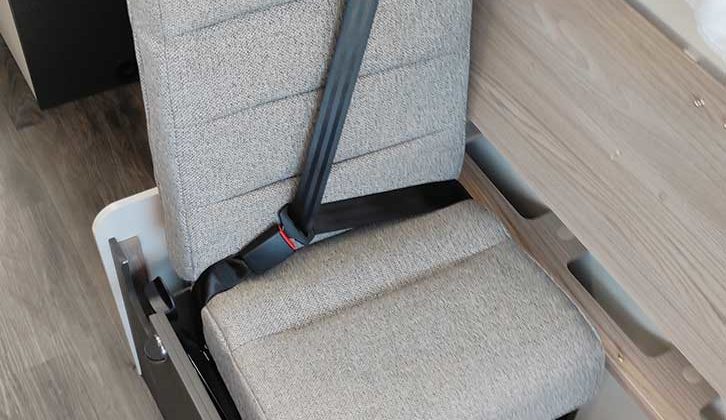 Assembled travel seat